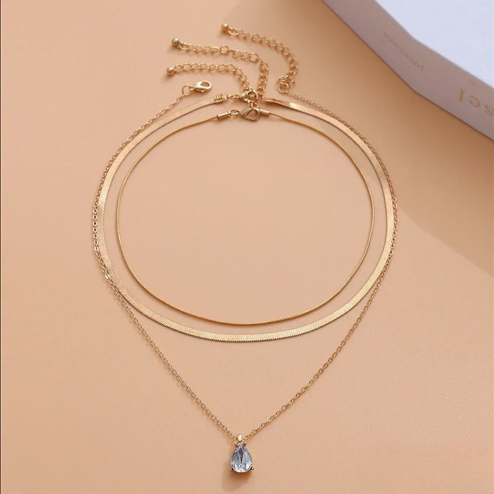 Layered necklace with gold-plated zirconia pendant